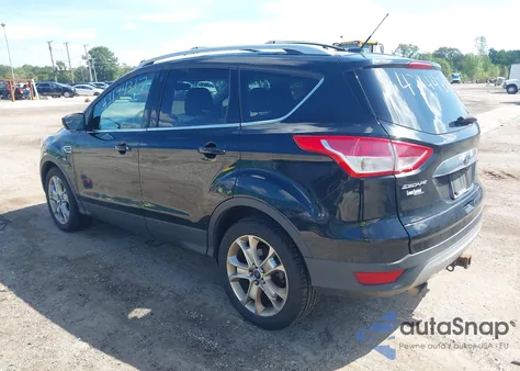 2016 Ford Escape Titanium z USA, uszkodzony, nr VIN 1FMCU9J90GUA43187